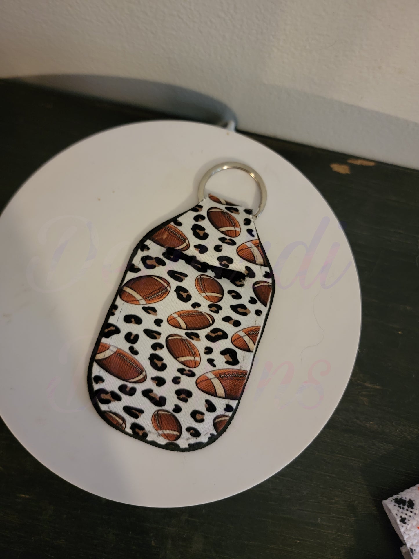 Hand sanitizer holder