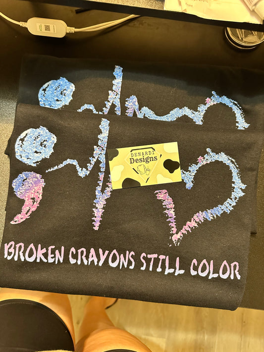 Broken crayons still color